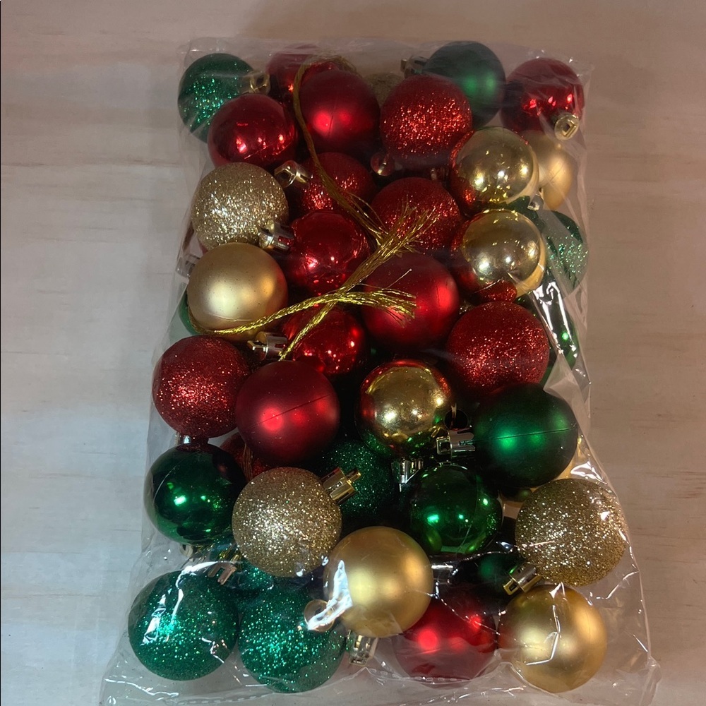 Festive Red, Green, and Gold Christmas Plastic Ornaments Bag Full